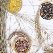 seagrass bundles made into coasters in multiple colours, from la basketry