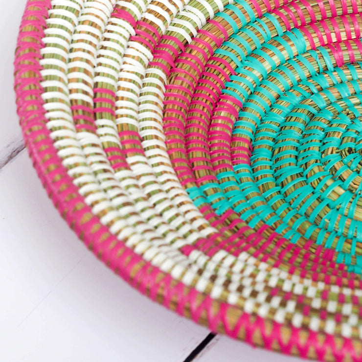 la basketry anne handwoven basket storage bowl pink and turquoise showing close up of beautiful star like pattern
